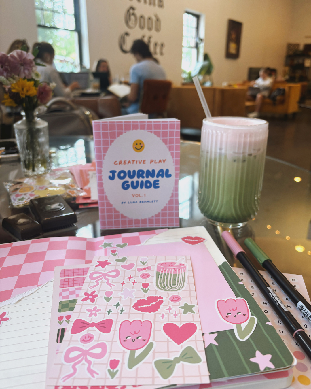 table with the matcha journal kit and journal guide preview